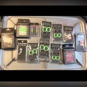 Lot of guages, tapers, and body piercing jewelry. New w tags